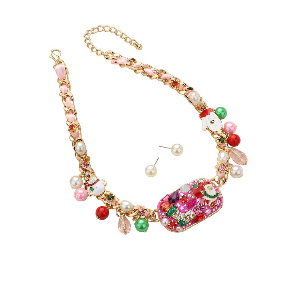 The Jingle Luxe - Holiday Glam Necklace features a vibrant gold chain with pink, red, green, and pearl accents, decorative charms, and matching pearl stud earrings—festive holiday jewelry shown on a white background.