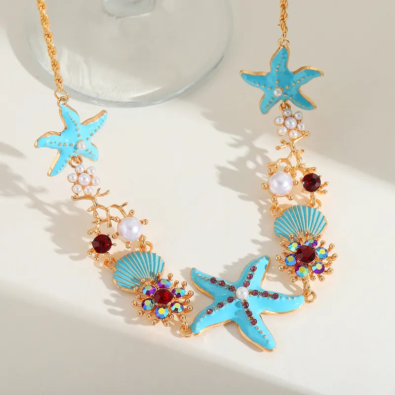 Ocean's Whisper - Blue Starfish Necklace