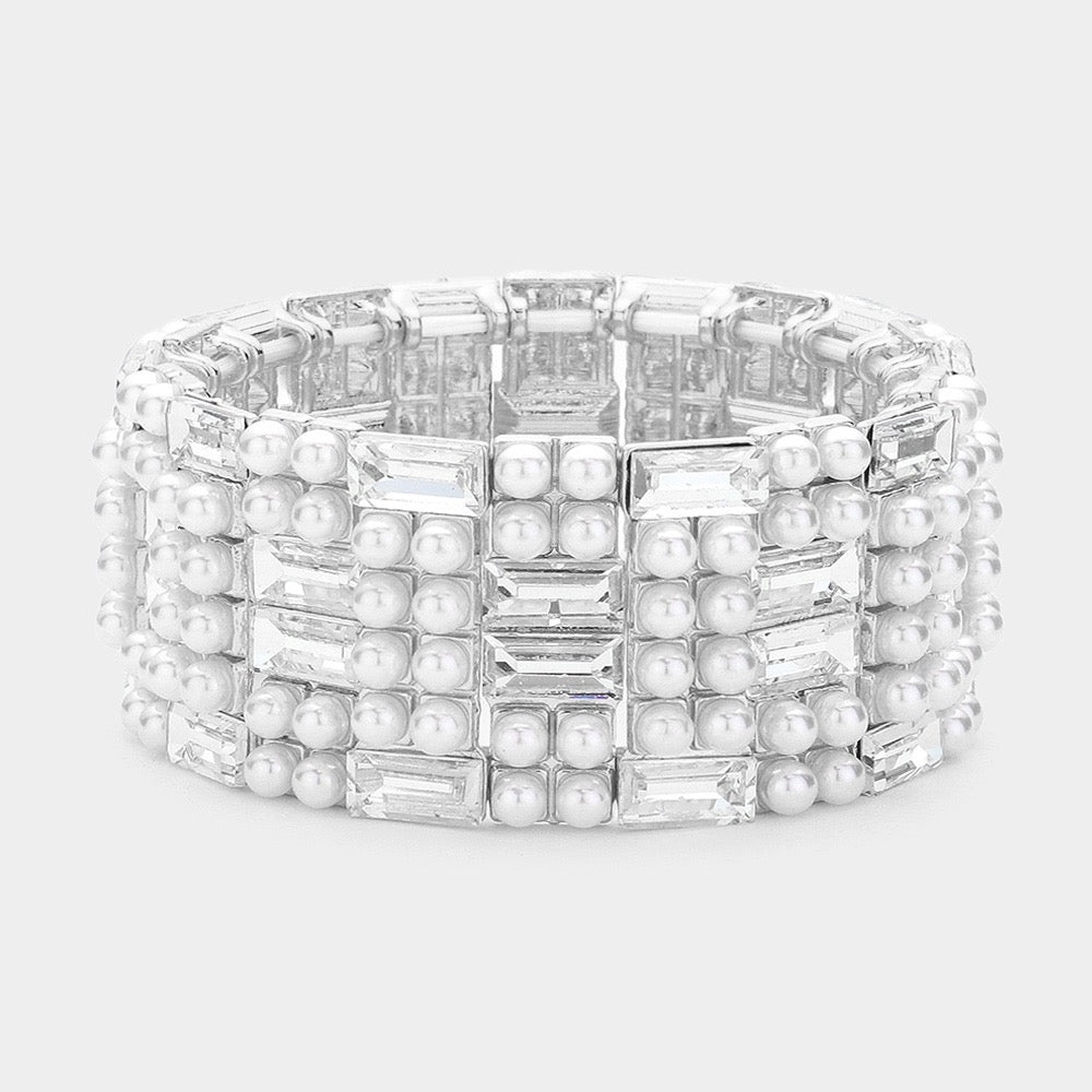 The Social Hour - Silver Bracelet features rows of rectangular clear rhinestones and small white pearls set in a geometric, grid-like pattern on a wide silver stretch band.