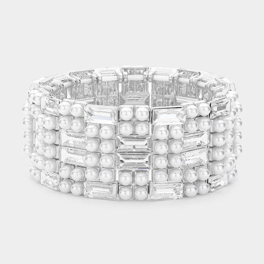 The Social Hour - Silver Bracelet features rows of rectangular clear rhinestones and small white pearls set in a geometric, grid-like pattern on a wide silver stretch band.